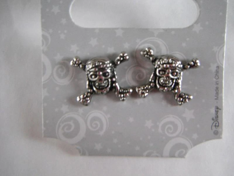 Boucles d'oreilles fantaisie disney pirates des caraibes neuves provenant du par